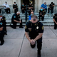Illustration for article titled Police Kneeling Is Meaningless